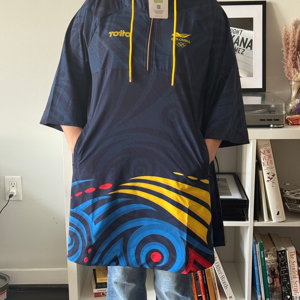 Olympics 2024 ColombiaUtility Jacket in Blue and Yellow with Bold Graphic Design